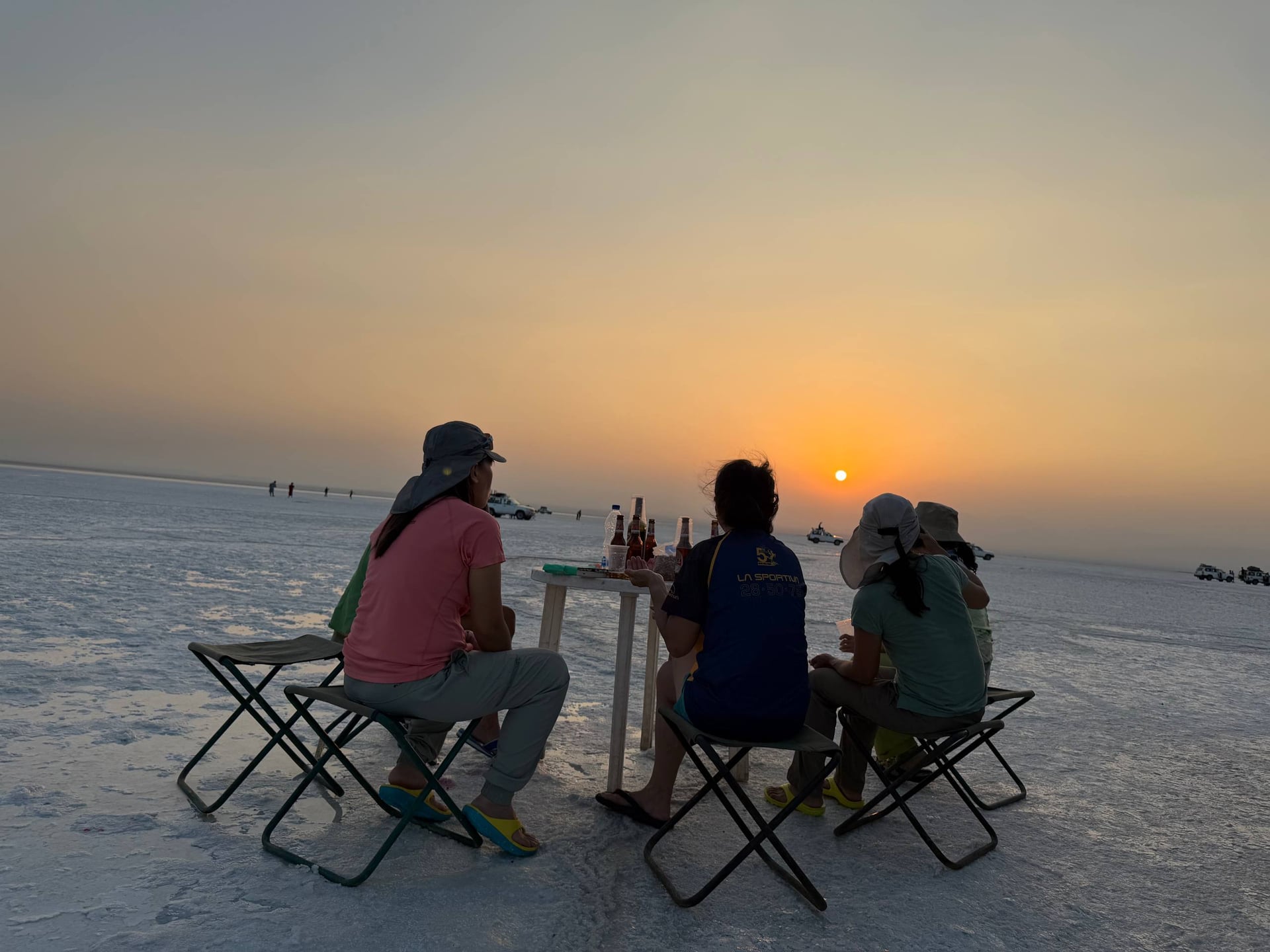 Guests watching sunset over the Danakil salt flats